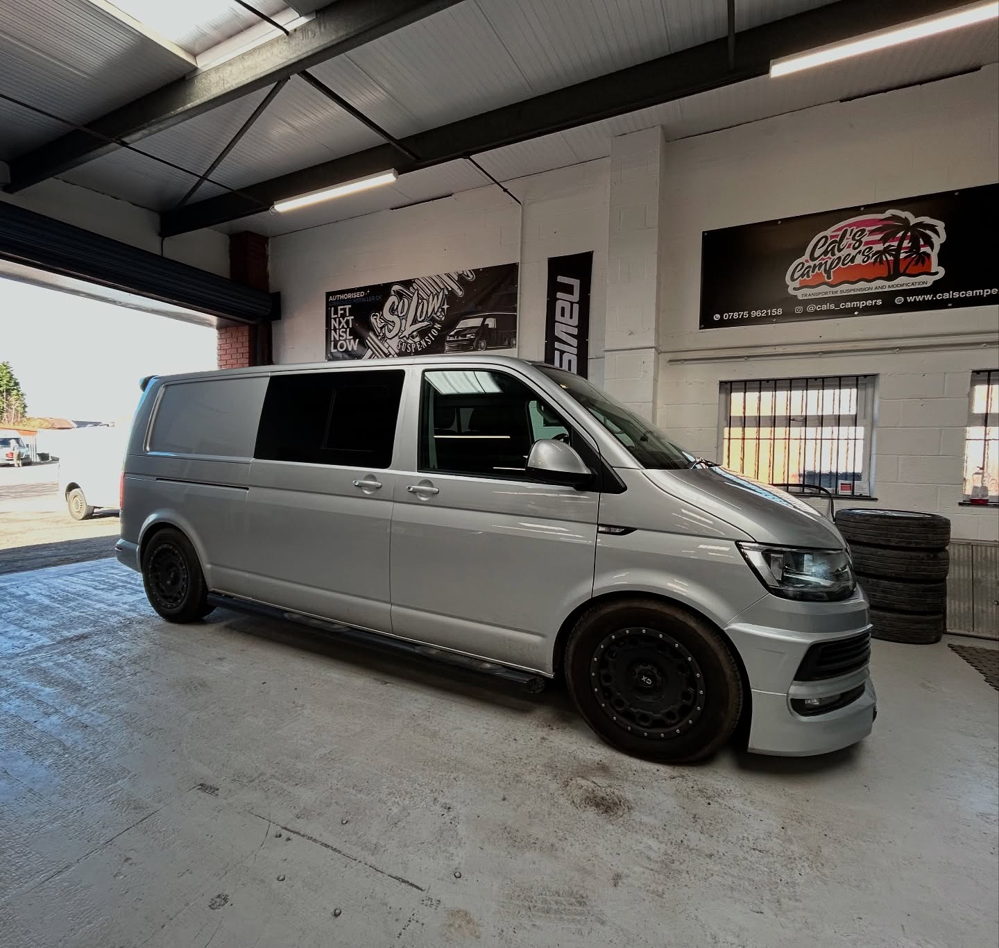 VW Transporter T6 lowered on custom coilovers by Cal's Campers