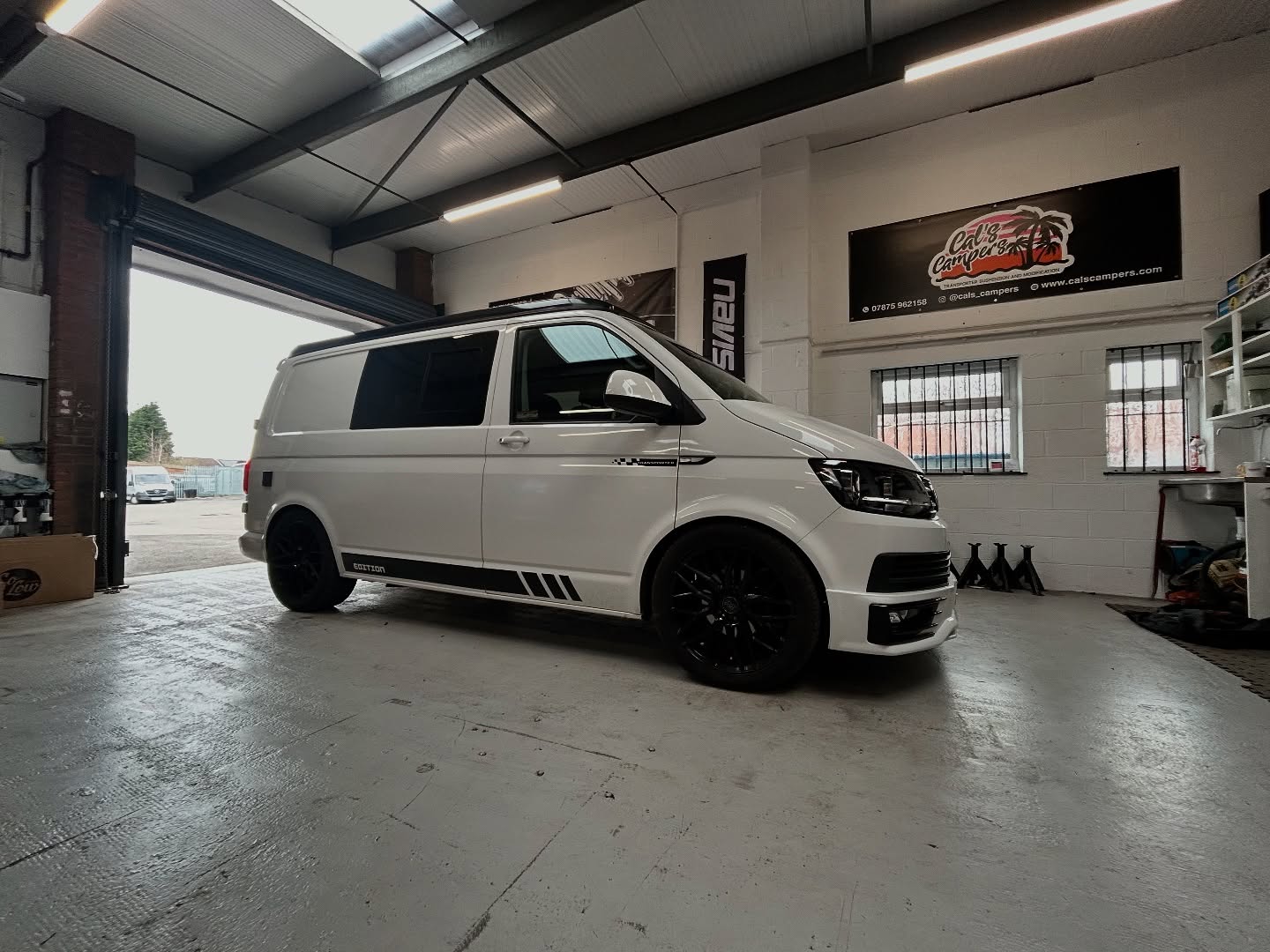 Lowered VW T5 on Rotiform wheels at car show